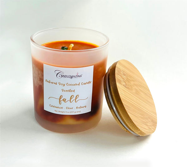 Beautiful Blend of Coconut and Soy wax make this lovely Fall scented candle with notes of cinnamon, clove, nutmeg and more. Marbled with orange color, complete with bamboo lid in a sturdy frosted glass jar